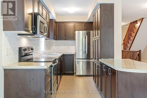 42 - 233 Duskywing Way, Oakville, ON - Indoor Photo Showing Kitchen With Upgraded Kitchen