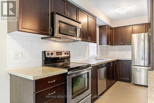 42 - 233 Duskywing Way, Oakville (Bronte West), ON - Indoor Photo Showing Kitchen With Upgraded Kitchen