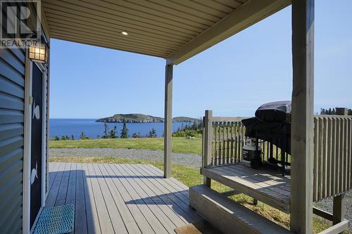 22 Grady'S Point Road, Bauline East, NL - Outdoor With Body Of Water With Deck Patio Veranda With View With Exterior