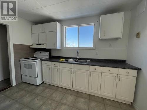 16 King Street North, Chapleau, ON - Indoor Photo Showing Kitchen With Double Sink