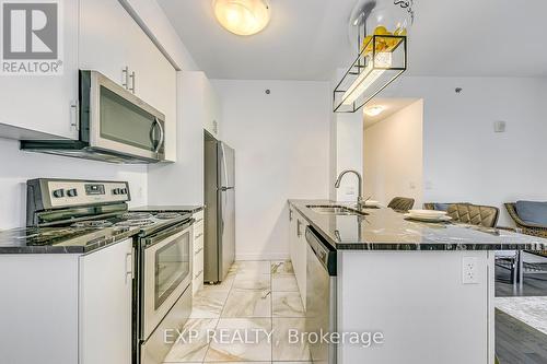 403 - 2490 Old Bronte Road, Oakville (Palermo West), ON - Indoor Photo Showing Kitchen With Stainless Steel Kitchen With Double Sink With Upgraded Kitchen