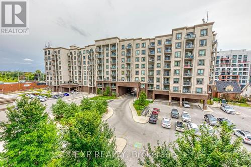 403 - 2490 Old Bronte Road, Oakville (Palermo West), ON - Outdoor With Facade