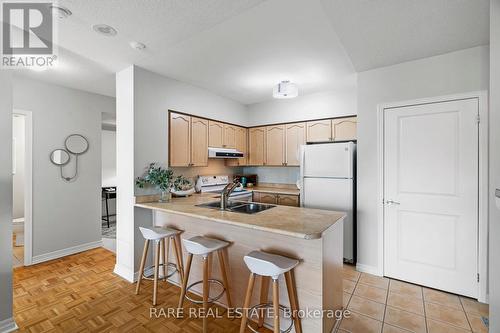 1310 - 38 Fontenay Court, Toronto (Edenbridge-Humber Valley), ON - Indoor Photo Showing Kitchen With Double Sink