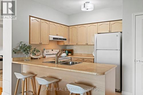 1310 - 38 Fontenay Court, Toronto (Edenbridge-Humber Valley), ON - Indoor Photo Showing Kitchen With Double Sink