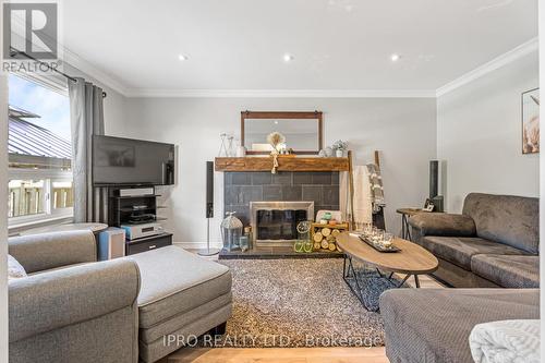 31 Nickel Crescent, Brampton, ON - Indoor Photo Showing Living Room With Fireplace