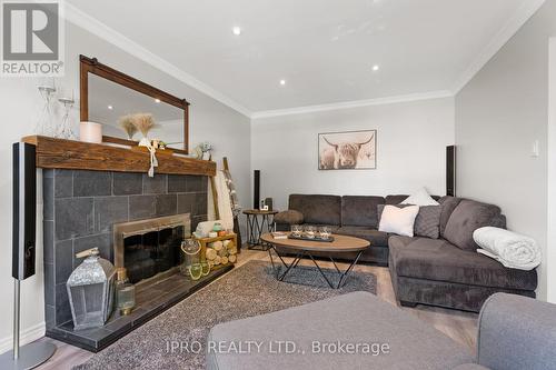 31 Nickel Crescent, Brampton, ON - Indoor Photo Showing Living Room With Fireplace