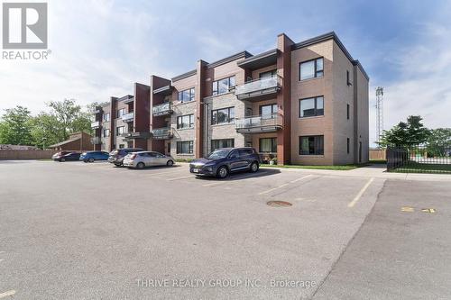 103 - 263 Butler Street, Lucan Biddulph (Lucan), ON - Outdoor With Facade