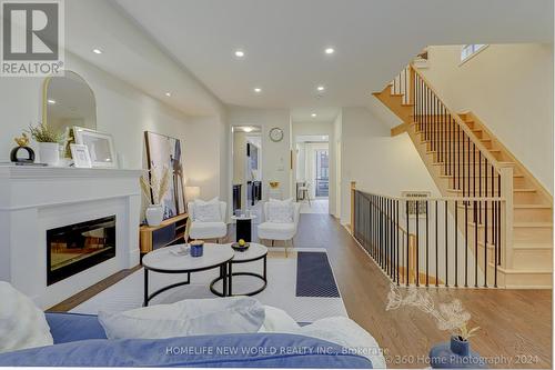 50 Lord Melborne Street, Markham (Victoria Square), ON - Indoor Photo Showing Living Room With Fireplace