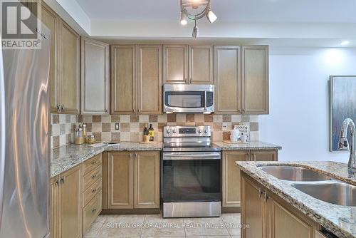 27 Asner Avenue, Vaughan, ON - Indoor Photo Showing Kitchen With Double Sink