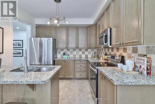 27 Asner Avenue, Vaughan, ON - Indoor Photo Showing Kitchen With Double Sink With Upgraded Kitchen