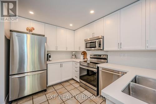 2059 White Dove Circle, Oakville (West Oak Trails), ON - Indoor Photo Showing Kitchen With Double Sink