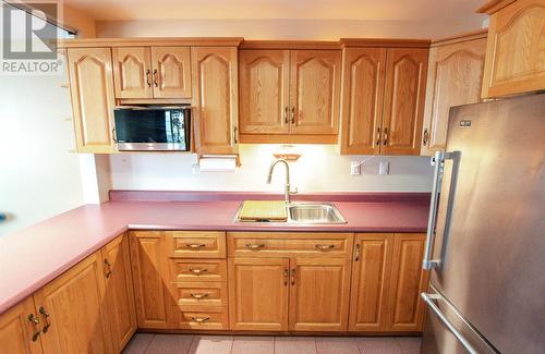 27 Carson Drive, Wabush, NL - Indoor Photo Showing Kitchen With Double Sink