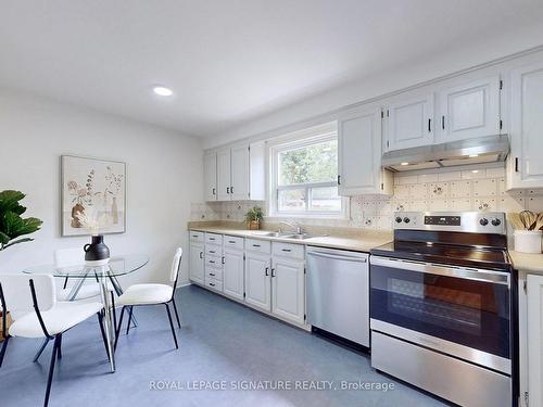 2 Conway Ave, Toronto, ON - Indoor Photo Showing Kitchen With Double Sink