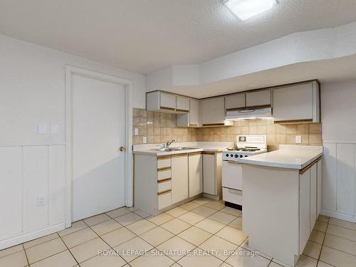 2 Conway Ave, Toronto, ON - Indoor Photo Showing Kitchen With Double Sink