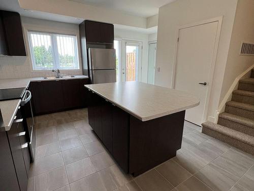 303-1525 Kingston Rd, Pickering, ON - Indoor Photo Showing Kitchen With Double Sink