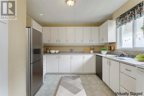 5 Forest Road, Chance Cove, NL - Indoor Photo Showing Kitchen With Double Sink