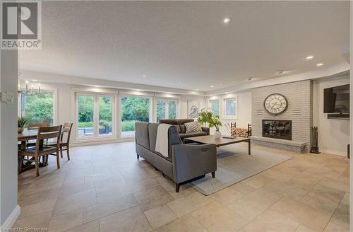 587 Manorwood Court, Waterloo, ON - Indoor Photo Showing Living Room With Fireplace