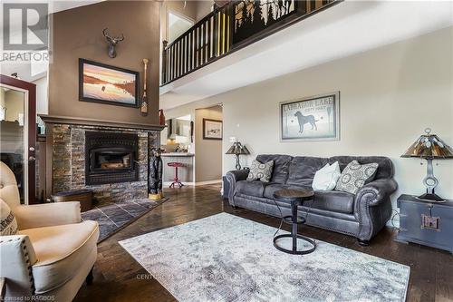 407047 Grey Road 4, Grey Highlands, ON - Indoor Photo Showing Living Room With Fireplace