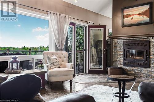 407047 Grey Road 4, Grey Highlands, ON - Indoor Photo Showing Living Room With Fireplace