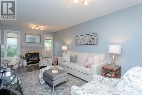 10 - 10 Rossmore Court, London, ON - Indoor Photo Showing Living Room With Fireplace