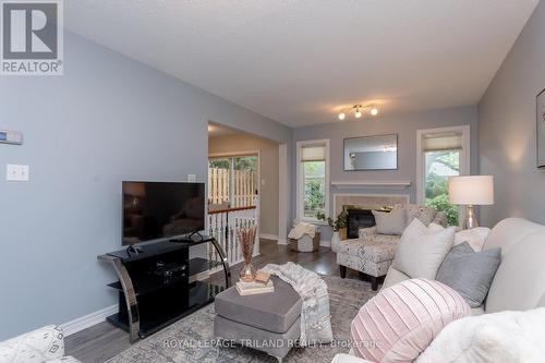 10 - 10 Rossmore Court, London, ON - Indoor Photo Showing Living Room With Fireplace