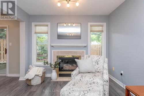 10 - 10 Rossmore Court, London, ON - Indoor Photo Showing Living Room With Fireplace