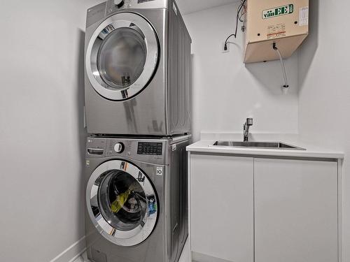 Salle de lavage - 915-5905 Boul. Du Quartier, Brossard, QC - Indoor Photo Showing Laundry Room