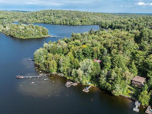 Photo aÃ©rienne - 18 Ch. Des Orioles, Sainte-Anne-Des-Lacs, QC - Outdoor With Body Of Water With View