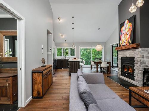 Salon - 18 Ch. Des Orioles, Sainte-Anne-Des-Lacs, QC - Indoor Photo Showing Living Room With Fireplace