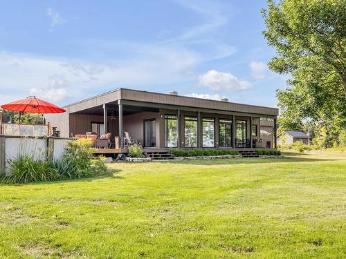 Back facade - 125  - 709A Boul. Taché O., Montmagny, QC - Outdoor With Deck Patio Veranda