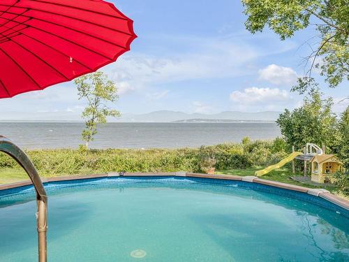 Piscine - 125  - 709A Boul. Taché O., Montmagny, QC - Outdoor With In Ground Pool With View