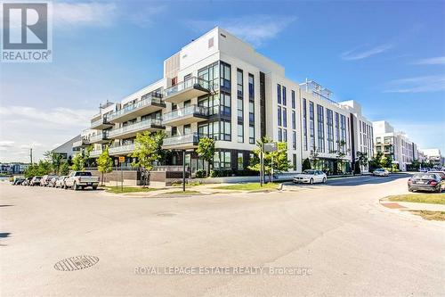 A307 - 241 Sea Ray Avenue, Innisfil, ON - Outdoor With Balcony With Facade