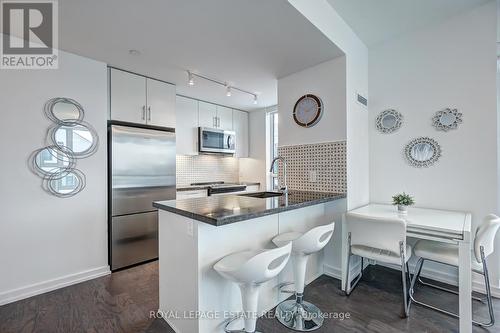 A307 - 241 Sea Ray Avenue, Innisfil, ON - Indoor Photo Showing Kitchen With Upgraded Kitchen