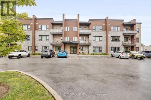 301 - 263 Butler Street, Lucan Biddulph (Lucan), ON - Outdoor With Facade