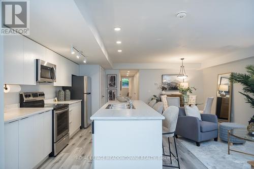 106 - 3058 Sixth Line, Oakville, ON - Indoor Photo Showing Kitchen With Stainless Steel Kitchen