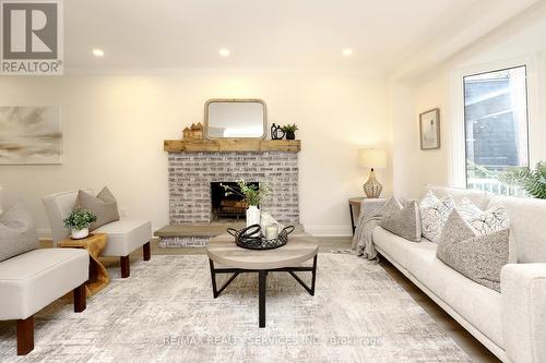 65 Hesp Drive, Caledon (Bolton West), ON - Indoor Photo Showing Living Room With Fireplace