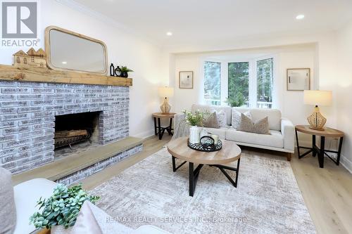 65 Hesp Drive, Caledon, ON - Indoor Photo Showing Living Room With Fireplace