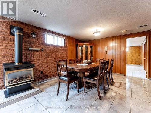 51 Warfield Drive, Toronto, ON - Indoor Photo Showing Dining Room With Fireplace