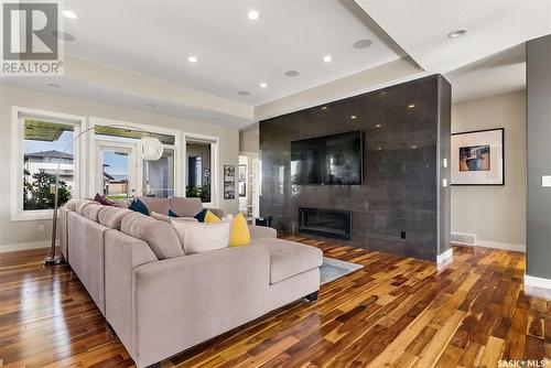 134 Aspen Village Drive, Emerald Park, SK - Indoor Photo Showing Living Room With Fireplace