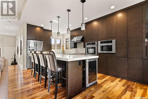 134 Aspen Village Drive, Emerald Park, SK - Indoor Photo Showing Kitchen With Upgraded Kitchen