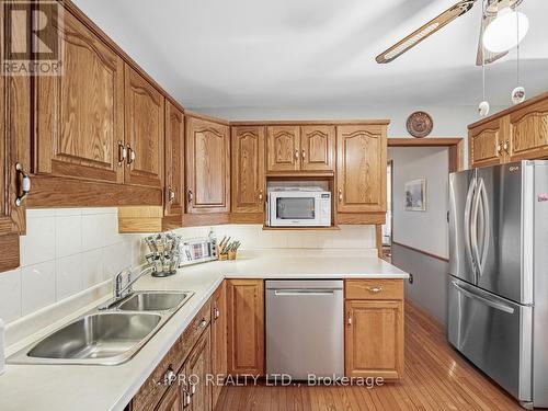 124 - 6540 Falconer Drive, Mississauga, ON - Indoor Photo Showing Kitchen With Double Sink