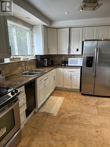 7076 Harwick Drive, Mississauga, ON - Indoor Photo Showing Kitchen With Double Sink