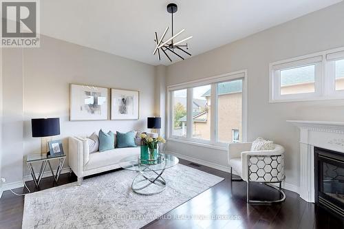 4 Hunters Corners, Markham, ON - Indoor Photo Showing Living Room With Fireplace