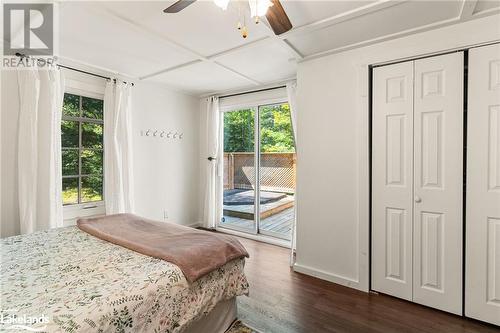 Walkout to deck of Primary - 19 High Bush Road, Lake St. Peter, ON - Indoor Photo Showing Bedroom