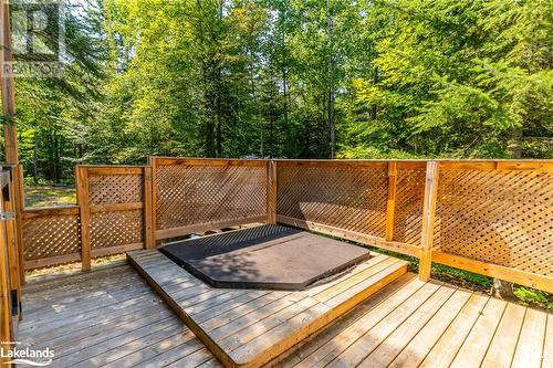 Hot tub off Primary Bedroom - 19 High Bush Road, Lake St. Peter, ON - Outdoor With Deck Patio Veranda