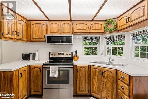 19 High Bush Road, Lake St. Peter, ON - Indoor Photo Showing Kitchen With Double Sink