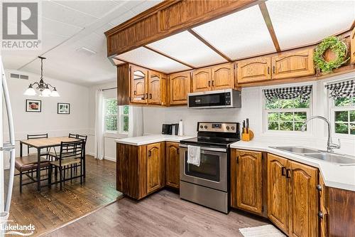 19 High Bush Road, Lake St. Peter, ON - Indoor Photo Showing Kitchen With Double Sink