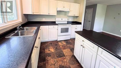 123 T Avenue S, Saskatoon, SK - Indoor Photo Showing Kitchen With Double Sink