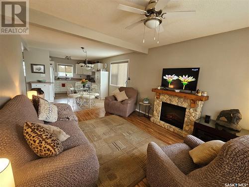 359 4Th Avenue Se, Swift Current, SK - Indoor Photo Showing Living Room With Fireplace