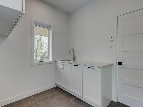 Laundry room - 1028 Rue Bissonnette, Saint-Blaise-Sur-Richelieu, QC - Indoor Photo Showing Other Room